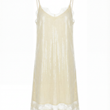 Beige slip dress with lace trim on a white background